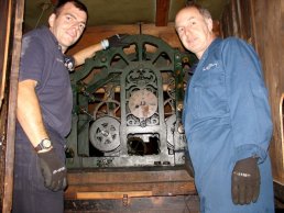 J.B. Joyce and Co. removing the clock works