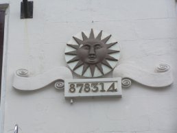 Sun plaque