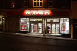 Woolworths frontage at night